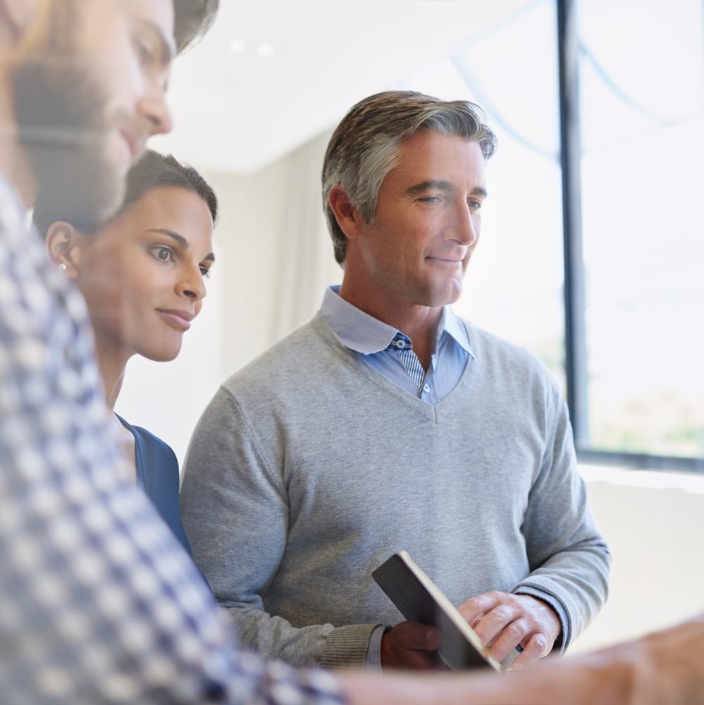 A photo of people in a business setting